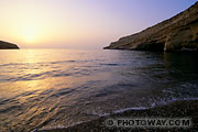 Matala at sunset wallpaper in Cretea