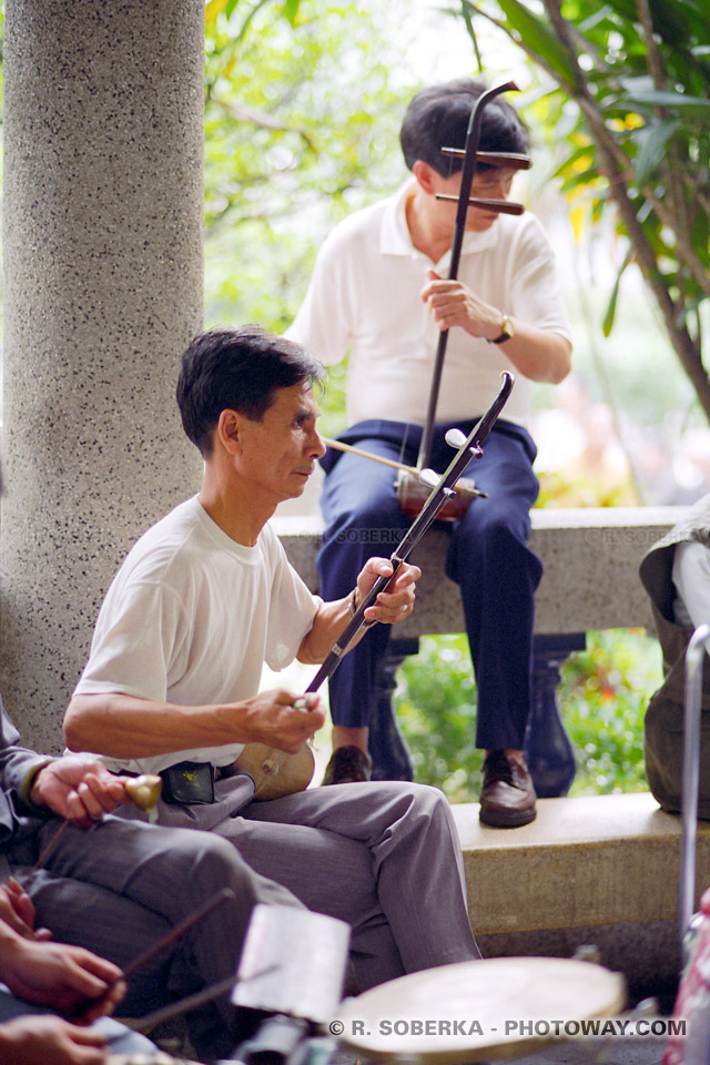 image Photos de musiciens photo dans un square de Macao guide de tourisme